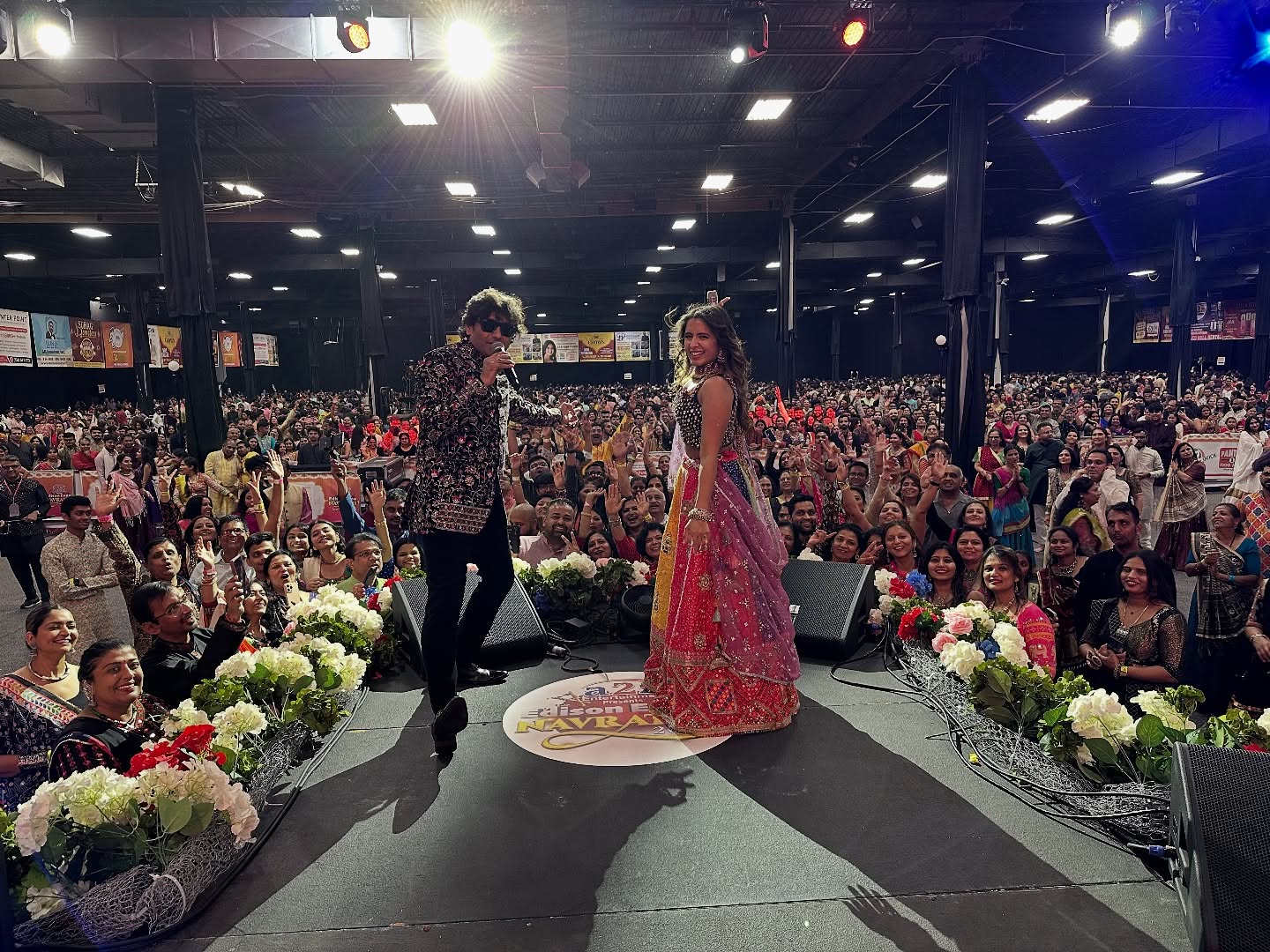 Aishwarya Majmudar receiving an award on stage