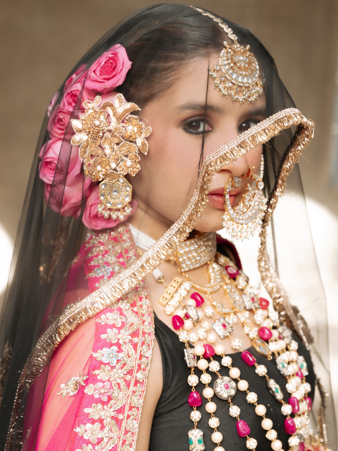 Aishwarya Majmudar performing live on stage with dramatic lighting